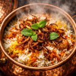 A steaming pot of authentic Dum Biryani illustrating the Secrets to Perfect Biryani